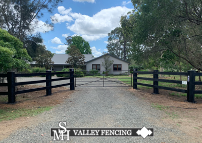 Rural Gateways - custom gateways - three rail post hardwood painted fencing and custom rural gates entryway - hunter valley fencing company - cessnock fencing